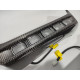 Front bumper lip spoiler with LEDs